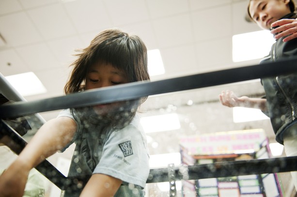 Ann Arbor resident and 9-year-old Natsuki Tsuji interacts with an experiment during the Southeastern Michigan Science Fair in the Morris Lawrence building at Washtenaw Community College on Saturday, March 9. Daniel Brenner I AnnArbor.com